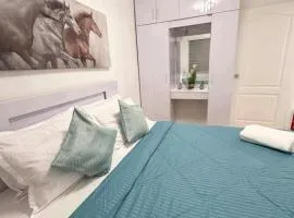 2BR Condo with Free Pool and Wifi beside SM Ecoland