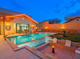 ADER DOĞA Villaları 4，位于Eskiömerler的酒店