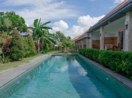 Urbanview Asung 2 Guesthouse Tibubeneng，位于Dalung的酒店