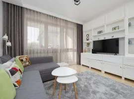 Family Apartment with Parking in Pruszków by Noclegi Renters
