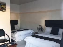 The Oasis Evergreen Lodge，位于Mpemba的酒店