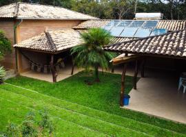 Pousada e Camping Claro Casa de Pedra，位于德尔菲诺波利斯的酒店