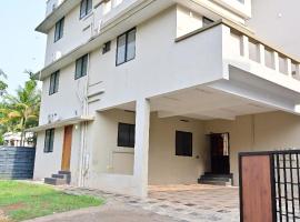 Abrigo Homes，位于科泽科德的酒店