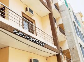 ROBIN HOMESTAY - In Budget and Comfortable Stay，位于帕格瓦拉的酒店