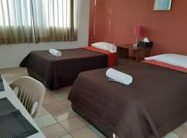 Suite Azalea, cocineta, baño privado, ubicación