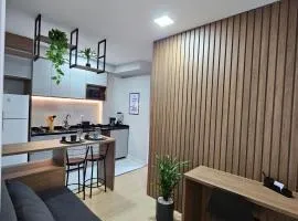 Studio 306, decorado com garagem e ar-condicionado