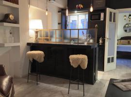 Unico Vintage cerca de Shopping Alto Rosario，位于罗萨里奥的酒店