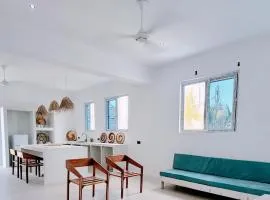 Modern Luxury 4 sleeper apartment Paje Beach Zanzibar TV WIFI AC centrally located
