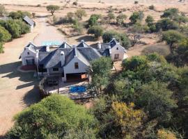 Zebula 1 Pela Lodge, 6 bedrooms，位于沃姆巴斯的酒店