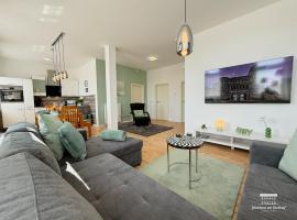 Komfort Ferienwohnungen mit Wellness-Garten - G&auml;stehaus am Bachlauf - Losheim am See，位于洛斯海姆的带停车场的酒店