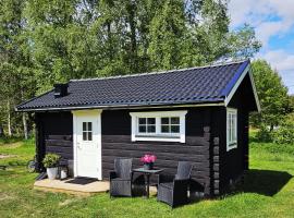 Mysig timmerstuga på dalagård，位于雷克桑德的酒店