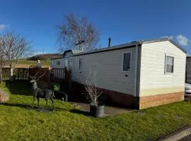 12 Field Views - 2 Bedrooms 2 bathrooms - 1 shower - 1 bath No sign written vans