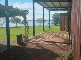 Container House by the River and Park