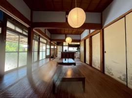 -大人数で泊まれる一棟貸し-なかまあじーんやー海近くの素敵な島暮らし体験-手久津久-，位于Kikaijima的酒店