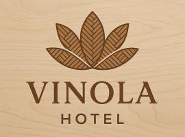 Vinola Hotel，位于马纳尔的带停车场的酒店