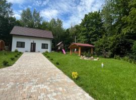Domek w lesie Sauna i Gorąca balia Wellness&Spa，位于Grybów的酒店