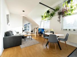 Urban Bloom apartments by Booky，位于利普托斯基米库拉斯的自助式住宿