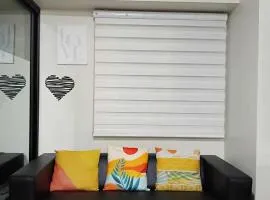 2 BEDROOM CONDO close to SM Tungko BULACAN ideal for Family Queen bed on Bedroom 1 accessible to Bedroom 2 with sliding doors Free Wifi & Netflix to watch in a comfy sofa & twin bed Access to SWIMMING POOL entry is very affordable and kids get for free