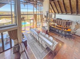 Buffalo Game Lodge，位于沃姆巴斯的酒店