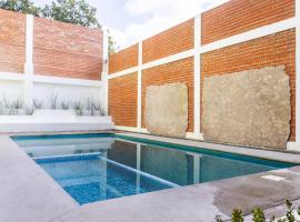 Capital O Hotel Emperadores Inn, Atlixco，位于阿特利斯科的酒店