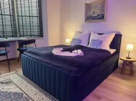 CuxHeaven - modernes Studio-Apartment direkt am Meer mit 65 Zoll TV und Tiefgarage in Duhnen