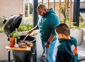 Recreatiewoning 'Steenpatrijs' op Gemoedelijk Vakantiepark，位于福尔特赫伊曾的海滩酒店