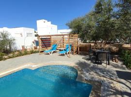 Appartement Les Oliviers avec piscine proche du lagon，位于塔格梅斯的公寓