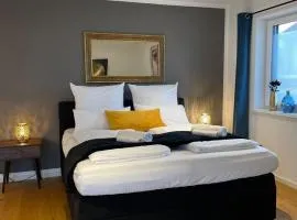 90m2 Loft I Kaffee I Terrasse I E-Parkplatz I 65' Smart TV