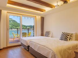 统营韩山滨海度假村 ，位于统营市的酒店