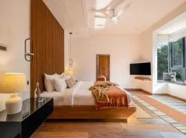 SaffronStays Miami - 4BR pet-friendly villa with glass-bottom pool, rooftop bar & Candolim proximity in North Goa