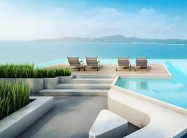 High Floor Beachfront 1 BR Condo with Scenic View，位于南芭堤雅的分契式公寓