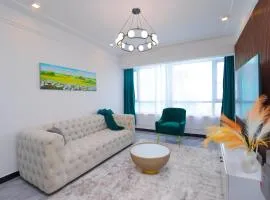2 Bedroom Grandiose Getaway - Skyline apartment with city view, fully furnished with cozy sits, WiFi, swimming pool and gym