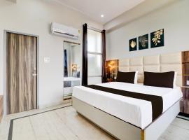 Super Hotel O Gold Inn，位于罗塔克的酒店