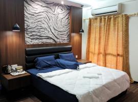 Nucifera Hotel Tambunan，位于Talongan的酒店