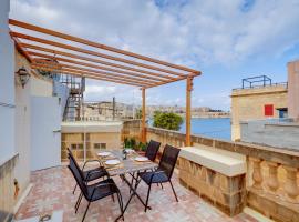 Traditional Maltese Townhouse with Roof Terrace，位于森格莱阿的酒店