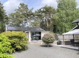 Modern Cottage with Deck in Sandskogen