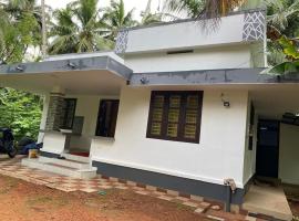 Thiruthi Homestay，位于Vallikunnu的酒店