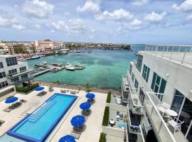 stunnig ocean view 2 BEDROOM, 2 bath with infinity pool，位于奥拉涅斯塔德的酒店