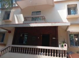 Heramb home stay，位于马尔万的酒店