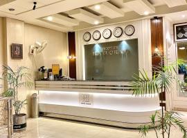 New Hotel Grand，位于费萨拉巴德的酒店