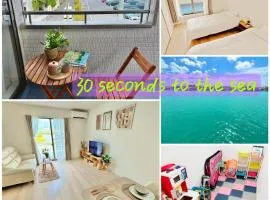 30-second walk to the sea! New house with a purple leaf! You can see the sea from every floor! There is also a children's playground and a baby crib!