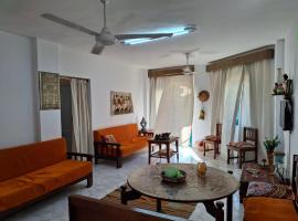 2 bedroom challet with private garden at Riviera beach resort Ras Sudr,Families only，位于拉斯苏德尔的酒店