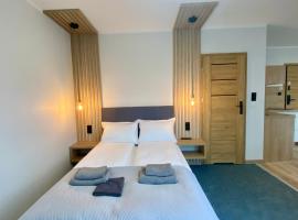 "Willa Octavia" Apartamenty , Pokoje，位于加茨比亚格拉的酒店