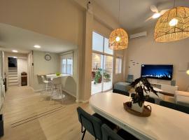 EcoCasa 12PAX perfecta grupos, reforma lujo, junto parada Burjassot metrovalencia, cerca centro Valencia y playa, lavadora, secadora equipamiento total，位于布尔哈索特的酒店