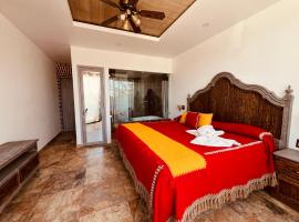 Hotel El Aguila, Villa del Carb&oacute;n，位于卡尔波镇的带停车场的酒店