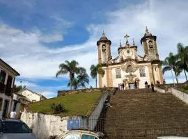 CASA RAIZ cama café e prosa