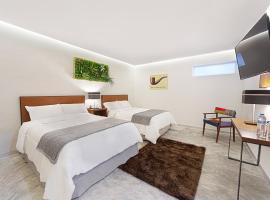 Hotel Urban 101，位于切图马尔国际机场 - CTM附近的酒店
