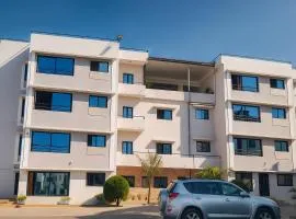 Milestone City Appartements-Pas de delestage-Restaurant-Près Tsimbazaza-Vue Palais de la Reine