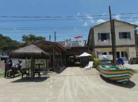 Bonita Ilha Frente Mar Guarujá，位于瓜鲁雅的酒店