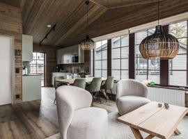 Parkstigens Fjällby - Kåvan，位于菲奈斯达伦的带停车场的酒店
